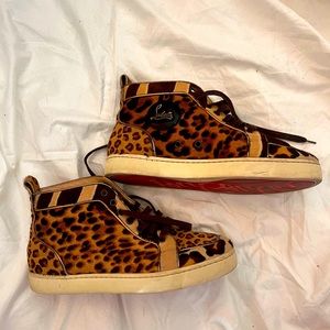 Christian Louboutin cheetah fur high top sneakers